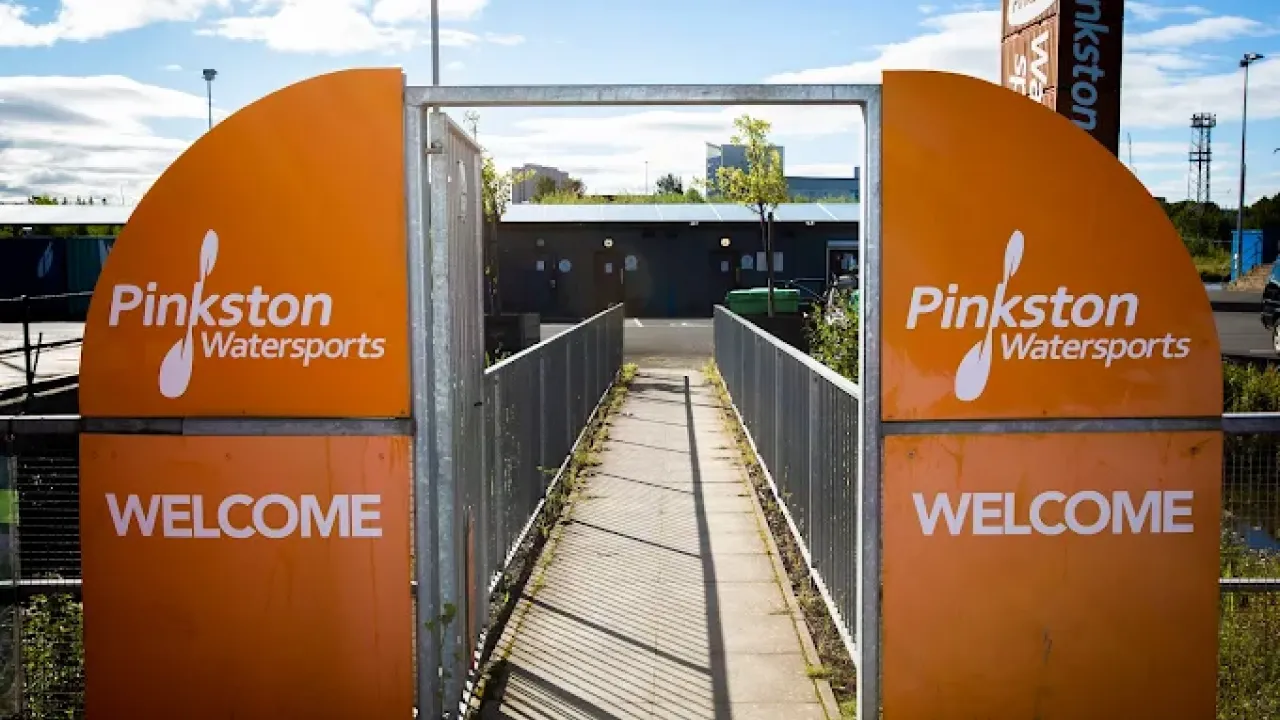 Welcome signs at the entrance gate of Pinkston Watersports in Glasgow.