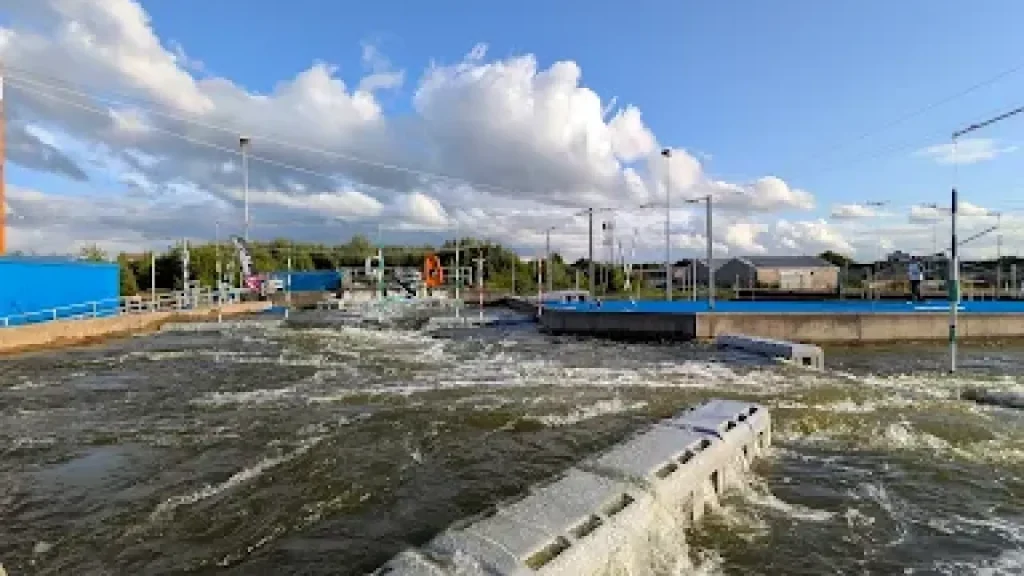 Aerial view of Pinkston Watersports, canal basin, and surrounding industrial and urban areas in Glasgow.